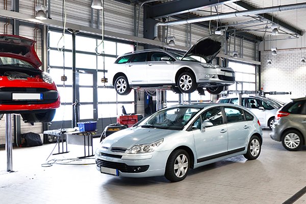 auto repair hood up elevated garage doors