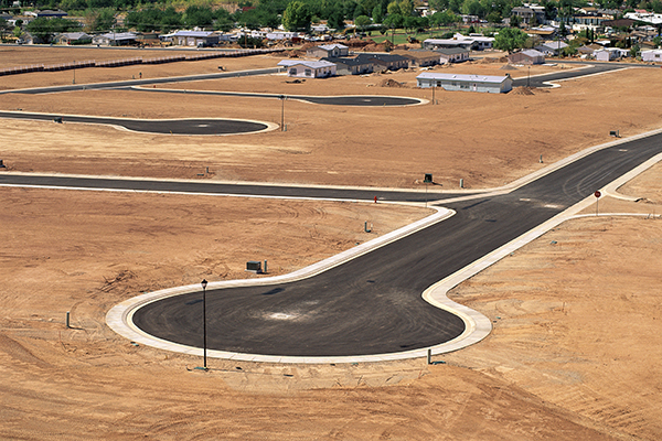 cul de sac paved new construction empty lots