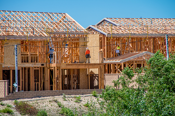 construction wood frames workers multifamily residential project